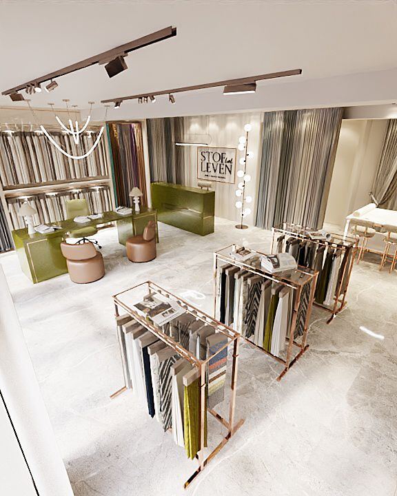 Eindresultaat — stoffeer-atelier met rekken, presentatietafels en lounge